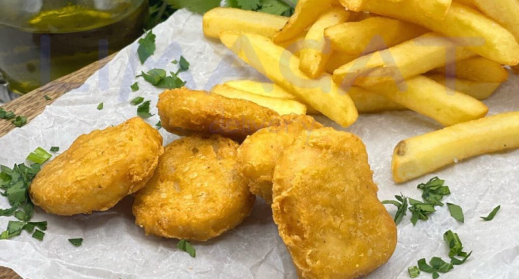 Kids' birthday table with chicken nuggets, kids cutlets and pasta from Limacat in Limassol