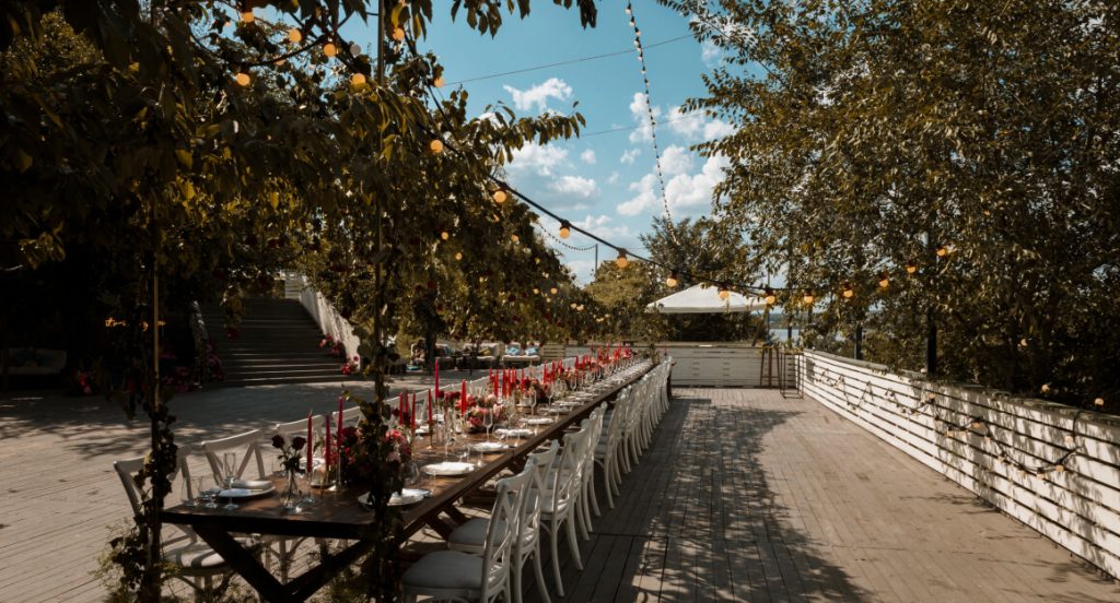 Turnkey catering buffet on a Limassol villa terrace with hot dishes and salads